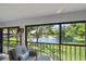 Enjoy tranquil pond views from this spacious patio with comfortable seating area at 764 Avenida Estancia # 212, Venice, FL 34292