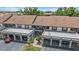 Elevated view of townhomes featuring garages and tile roofs at 764 Avenida Estancia # 212, Venice, FL 34292