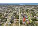 The aerial view shows the home's location with arrow, screened pool, neighborhood, and proximity to the water at 888 Kimball Rd, Venice, FL 34293