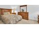 Cozy main bedroom with neutral décor and ample natural light at 9413 Carnaby Dr, Venice, FL 34293