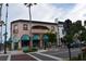 Charming downtown building with arched awnings, showcasing the area's architecture and pedestrian-friendly street at 942 Capri Isles Blvd # 105, Venice, FL 34292