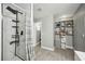 Modern bathroom featuring a glass enclosed shower and shelving at 10047 Greetings St, Port Charlotte, FL 33981