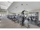 Well-equipped fitness center features modern exercise machines and natural light, promoting a healthy lifestyle at 11007 Batello Dr, Venice, FL 34292