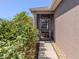 Screened entryway and walkway, providing access to a home's front door at 11924 Tempest Harbor Loop, Venice, FL 34292