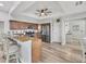 Well-equipped kitchen featuring granite countertops, stainless steel appliances, and a breakfast bar at 1500 Lemon Bay Dr, Venice, FL 34293