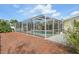 Charming screened in pool offers the perfect space for relaxation and enjoying the outdoors at 1537 Overbrook Rd, Englewood, FL 34223