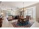 Open-concept living spaces connecting the dining room and living room for easy entertaining at 1625 Lancashire Dr, Venice, FL 34293