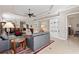 Comfortable living spaces showing the living room, dining room, and kitchen, perfect for entertaining guests at 1625 Lancashire Dr, Venice, FL 34293