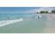 Beautiful beach with shallow water on a sunny day, ideal for swimming and enjoying the coastal lifestyle at 1653 Albino St, Nokomis, FL 34275