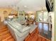 Open living space with hardwood floors, fireplace, and direct access to the dining area at 1653 Albino St, Nokomis, FL 34275
