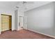 Bedroom with carpet and ceiling fan, and closet space at 2094 Mesic Hammock Way, Venice, FL 34292