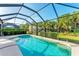 This screened-in pool sparkles beneath the open sky offering a refreshing retreat within a private setting at 2094 Mesic Hammock Way, Venice, FL 34292