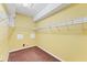 Spacious walk-in closet with shelving and carpeted floor at 2094 Mesic Hammock Way, Venice, FL 34292