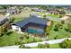 Beautiful home with a screened-in pool and lush landscaping in a tranquil residential neighborhood at 23 Tiffany St, Englewood, FL 34223