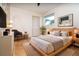 Cozy bedroom featuring a modern design, a comfortable bed, and stylish decor at 23 Tiffany St, Englewood, FL 34223