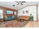 Cozy living room featuring hardwood floors, stylish sofas, and a decorative rug at 23 Tiffany St, Englewood, FL 34223