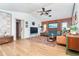 Inviting living room features high ceilings, hardwood floors, and stylish decor at 23 Tiffany St, Englewood, FL 34223