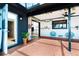 Enclosed outdoor patio with stylish furniture, brick flooring, and access to the indoor living space at 23 Tiffany St, Englewood, FL 34223