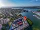 Aerial view of waterfront condo complex with boat docks and beautiful bay views at 250 Santa Maria St # 216, Venice, FL 34285