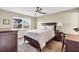 Bedroom featuring wood-look floors, plenty of natural light and stylish furniture at 250 Santa Maria St # 216, Venice, FL 34285