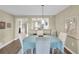 This dining room is bright and adjacent to the kitchen at 250 Santa Maria St # 216, Venice, FL 34285