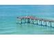 View of the Venice Fishing Pier extending into the Gulf of Mexico on a clear day at 250 Santa Maria St # 216, Venice, FL 34285