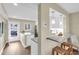 A modern eat-in kitchen with stainless steel appliances, granite countertops, and a breakfast bar at 250 Santa Maria St # 216, Venice, FL 34285
