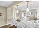 This kitchen features granite countertops, stainless steel appliances, and ample counter space at 250 Santa Maria St # 216, Venice, FL 34285