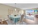 Open living room with dining area and harbor view at 250 Santa Maria St # 216, Venice, FL 34285