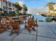 Relaxing outdoor patio area overlooking the harbor at 250 Santa Maria St # 216, Venice, FL 34285