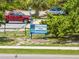 Entrance sign for Service Club Park highlighting the park's offerings and location at 250 Santa Maria St # 216, Venice, FL 34285
