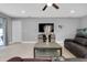 Spacious living area with tile flooring, contemporary furnishings, and bright, neutral paint at 4068 Palau Dr, Sarasota, FL 34241