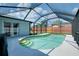 A beautiful, clear screened-in pool with steps at 4068 Palau Dr, Sarasota, FL 34241