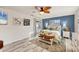 Comfortable bedroom featuring a sliding glass door to the pool and outdoor views at 4305 Sandune Ave, North Port, FL 34287