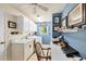 Well-equipped laundry room with ample counter space, cabinets, and a washer/dryer at 4305 Sandune Ave, North Port, FL 34287