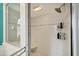 Close-up on bathroom shower showcasing tiled walls and seating at 4305 Sandune Ave, North Port, FL 34287