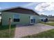 Enclosed backyard featuring a brick patio, lawn, and room to relax at 4835 San Ortebello Dr, Bradenton, FL 34208