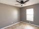 This bedroom has light streaming through the window, brightening up the neutral paint at 4835 San Ortebello Dr, Bradenton, FL 34208