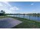 Relax by the pond in this backyard, which offers a gorgeous pond view at 4835 San Ortebello Dr, Bradenton, FL 34208