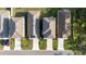 Aerial view of rooftops in a residential neighborhood, showcasing well-maintained lawns at 4907 Wedgeleaf Way, Palmetto, FL 34221