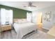 Comfortable bedroom featuring a neutral color scheme and natural light at 4907 Wedgeleaf Way, Palmetto, FL 34221