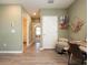 Flex room with a desk and view to adjacent rooms at 4907 Wedgeleaf Way, Palmetto, FL 34221