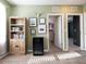 Flex space with built-in bookshelves and neutral decor at 4907 Wedgeleaf Way, Palmetto, FL 34221