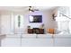 Cozy living space with a large sectional sofa, entertainment center, and contemporary design at 4907 Wedgeleaf Way, Palmetto, FL 34221