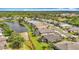 Desirable neighborhood with lush landscaping, serene ponds, and well-maintained homes at 5384 Layton Dr, Venice, FL 34293