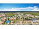 Beautiful aerial view showcasing the neighborhood, a serene lake, and the surrounding lush landscape at 5384 Layton Dr, Venice, FL 34293