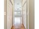 Hallway showing flooring that leads to a bedroom at 5384 Layton Dr, Venice, FL 34293