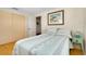 Well-lit bedroom offering hardwood floors and a neutral color palette at 595 Circlewood Dr # Y4, Venice, FL 34293