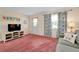 Cozy living room with floral curtains, comfortable seating, and bright, inviting decor at 595 Circlewood Dr # Y4, Venice, FL 34293