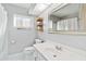 Cozy bathroom featuring neutral tones, a vanity, and a combined shower and tub at 8300 Parkside Dr, Englewood, FL 34224